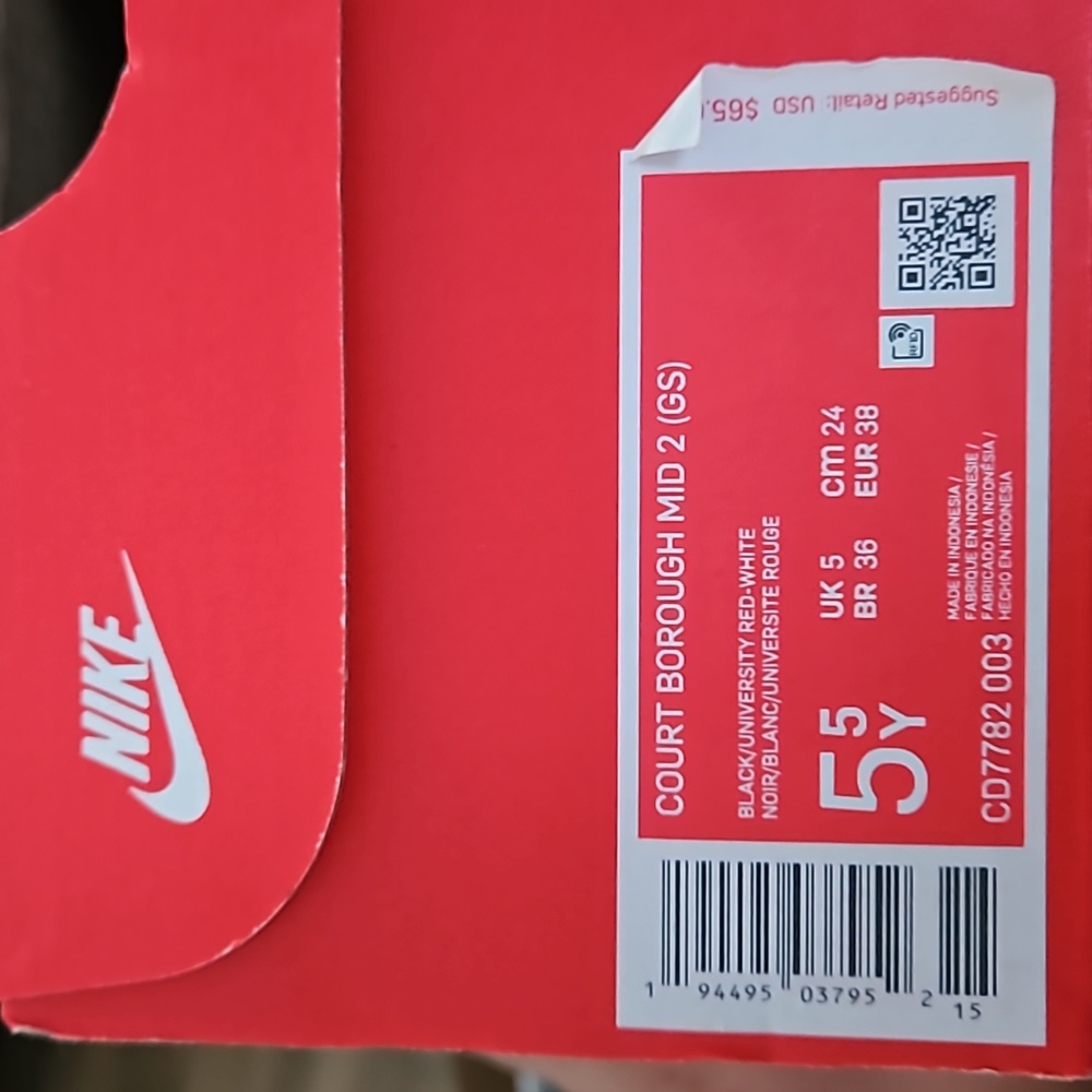 Red and black nike shoes
